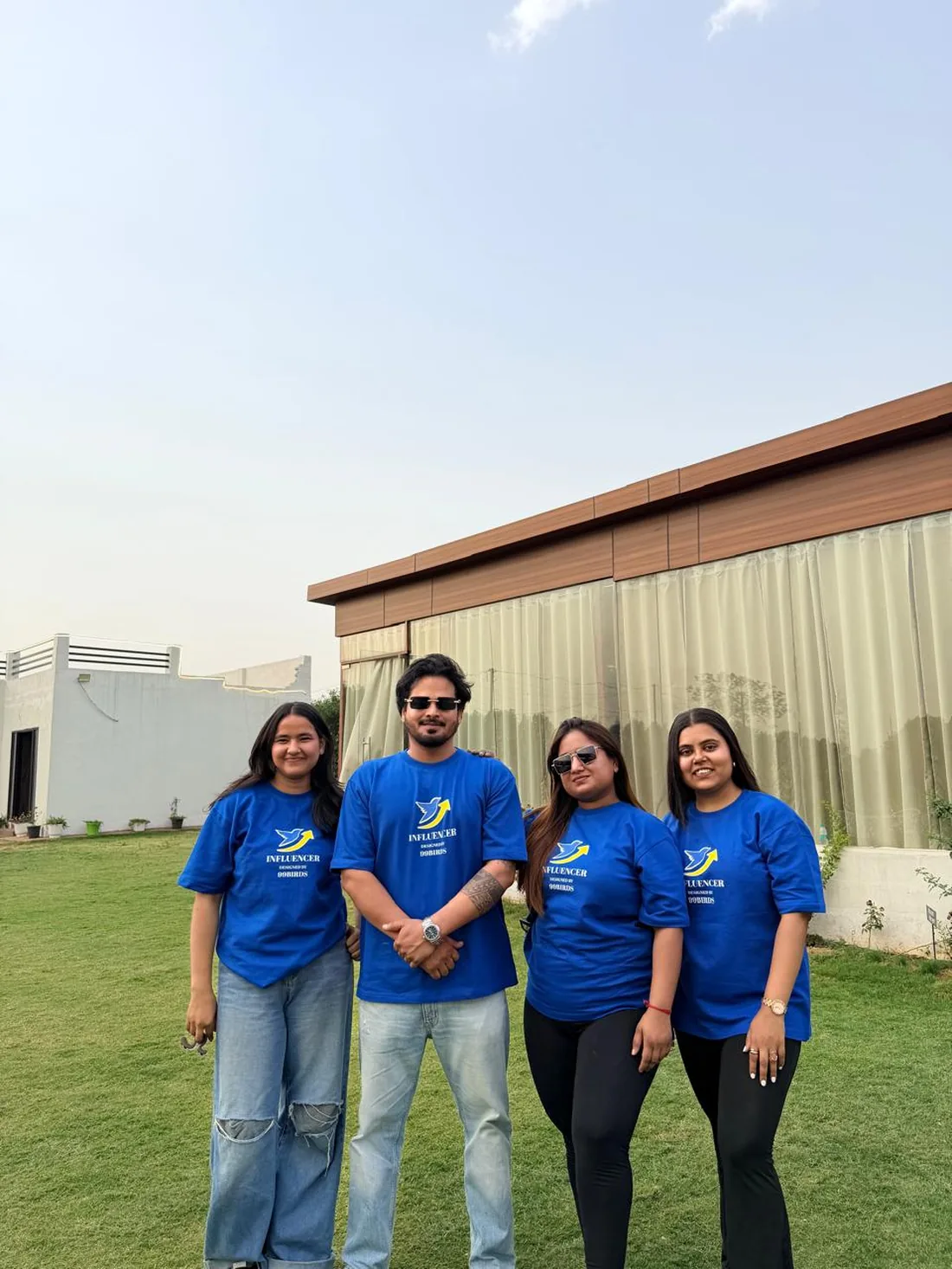 The 99Birds team celebrating company milestones outdoors